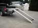 Custom-made aluminum snowmobile deck for a fullsize picup truck bed.